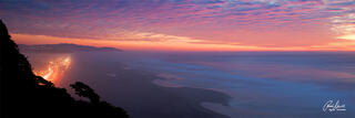 A majestic panorama sunset of the Pacific Ocean, the west end of the Golden Gate Park and the Great Highway ﻿from Sutro Heights viewpoint ﻿in San Francisco.