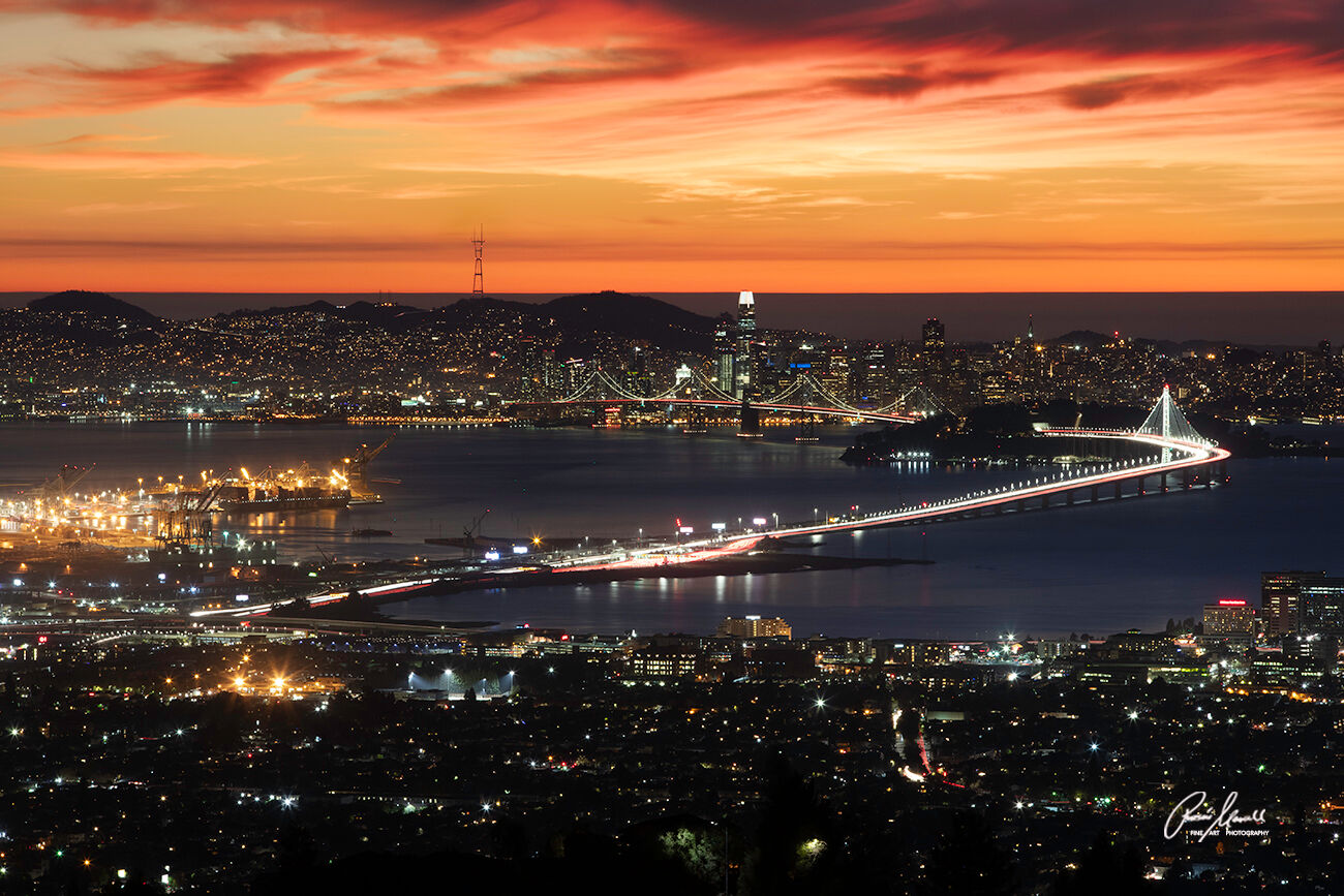 A magnificent sunset overlooking the East Bay, Bay Bridge, Treasure Island and the San Francisco Skyline from the Oakland Hills.﻿